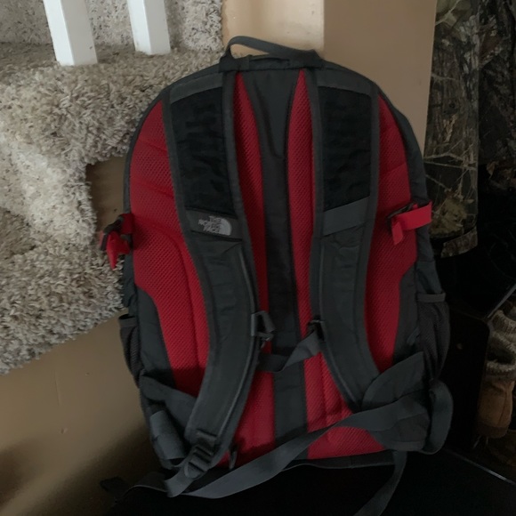 THE NORTH FACE BOOK BAG BLACK GRAY ON THE FRONT AND RED ON THE BACK. - Picture 2 of 4